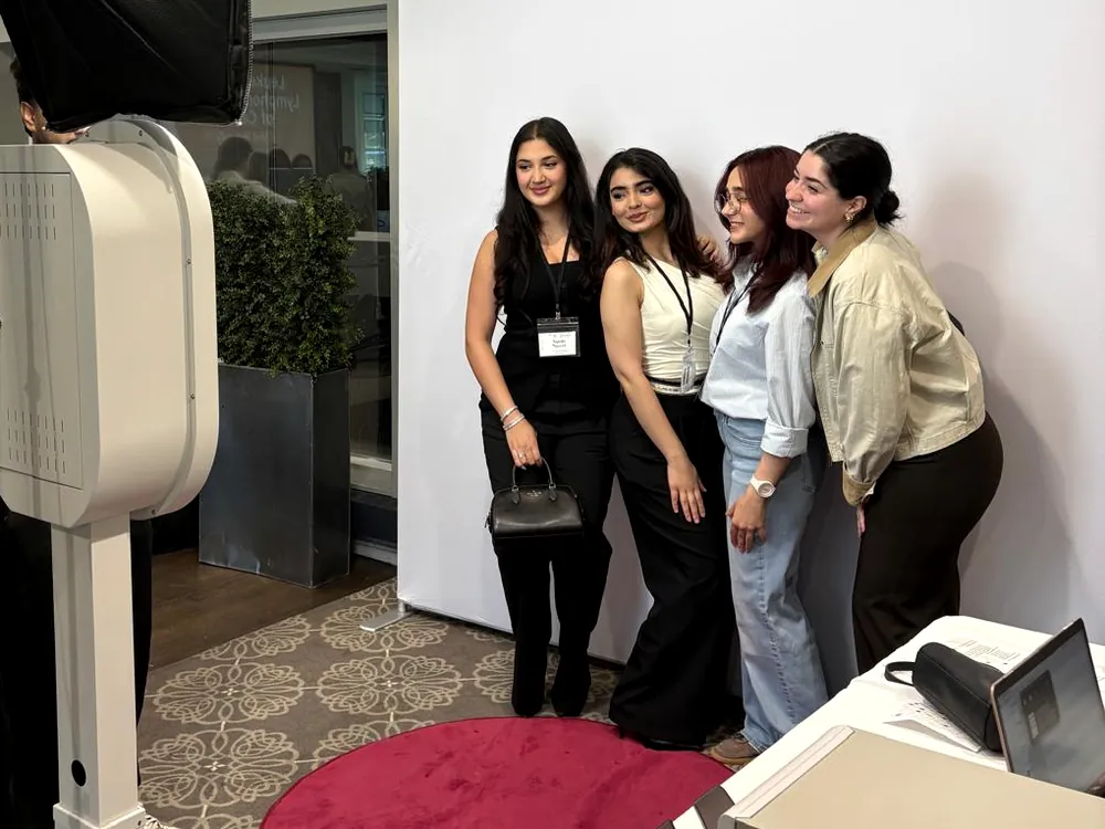 Guests posing at a Verus Studios open-air photo booth